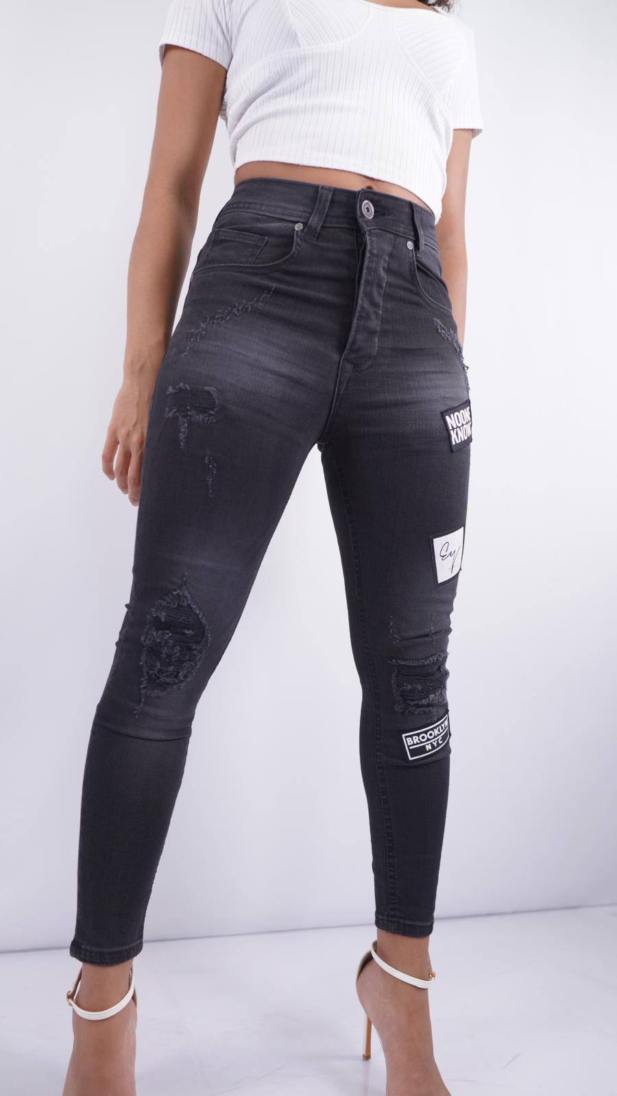 S-207 – Women’s High-Waist Black Skinny Jeans with Rips & One-Leg Patchwork