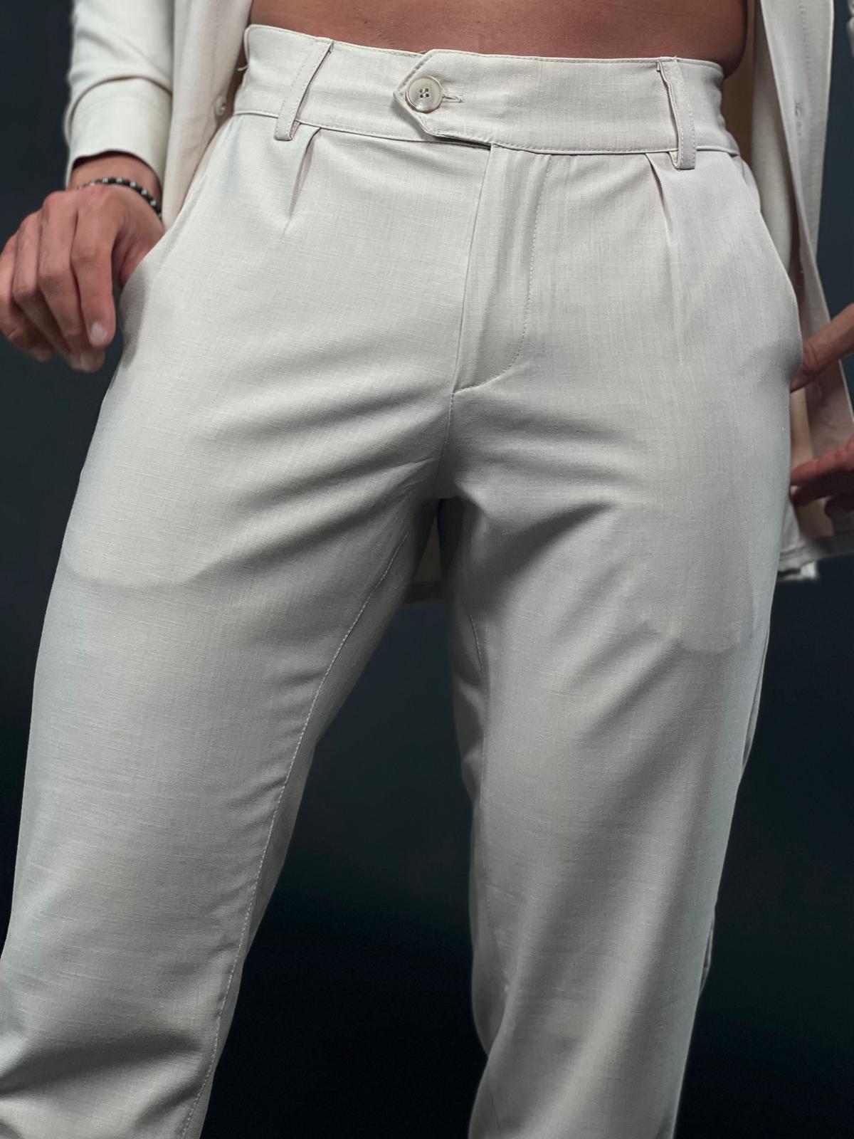 מכנסיים אלגנטיים של Max Mara מבד פשתן רך בגזרה ישרה.