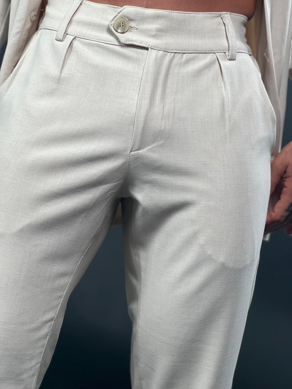 מכנסיים אלגנטיים של Max Mara מבד פשתן רך בגזרה ישרה.