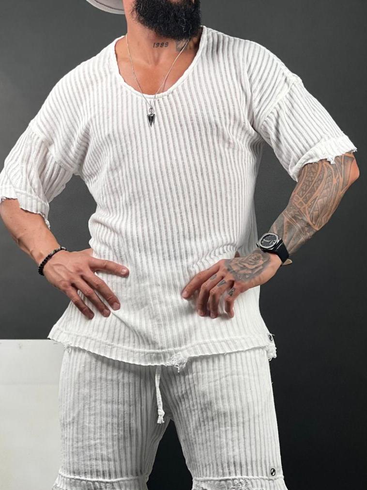 Oversized short-sleeve shirt with a rounded neckline made from striped linen fabric.