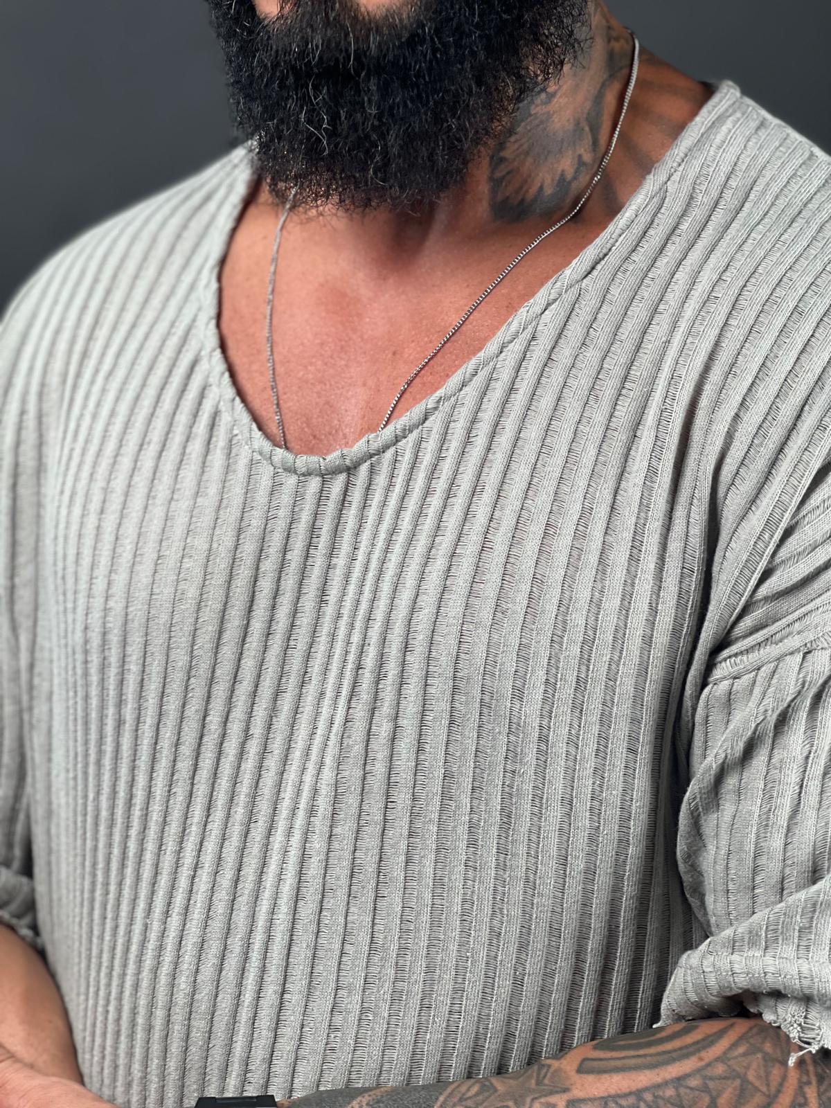 Oversized short-sleeve shirt with a rounded neckline made from striped linen fabric.