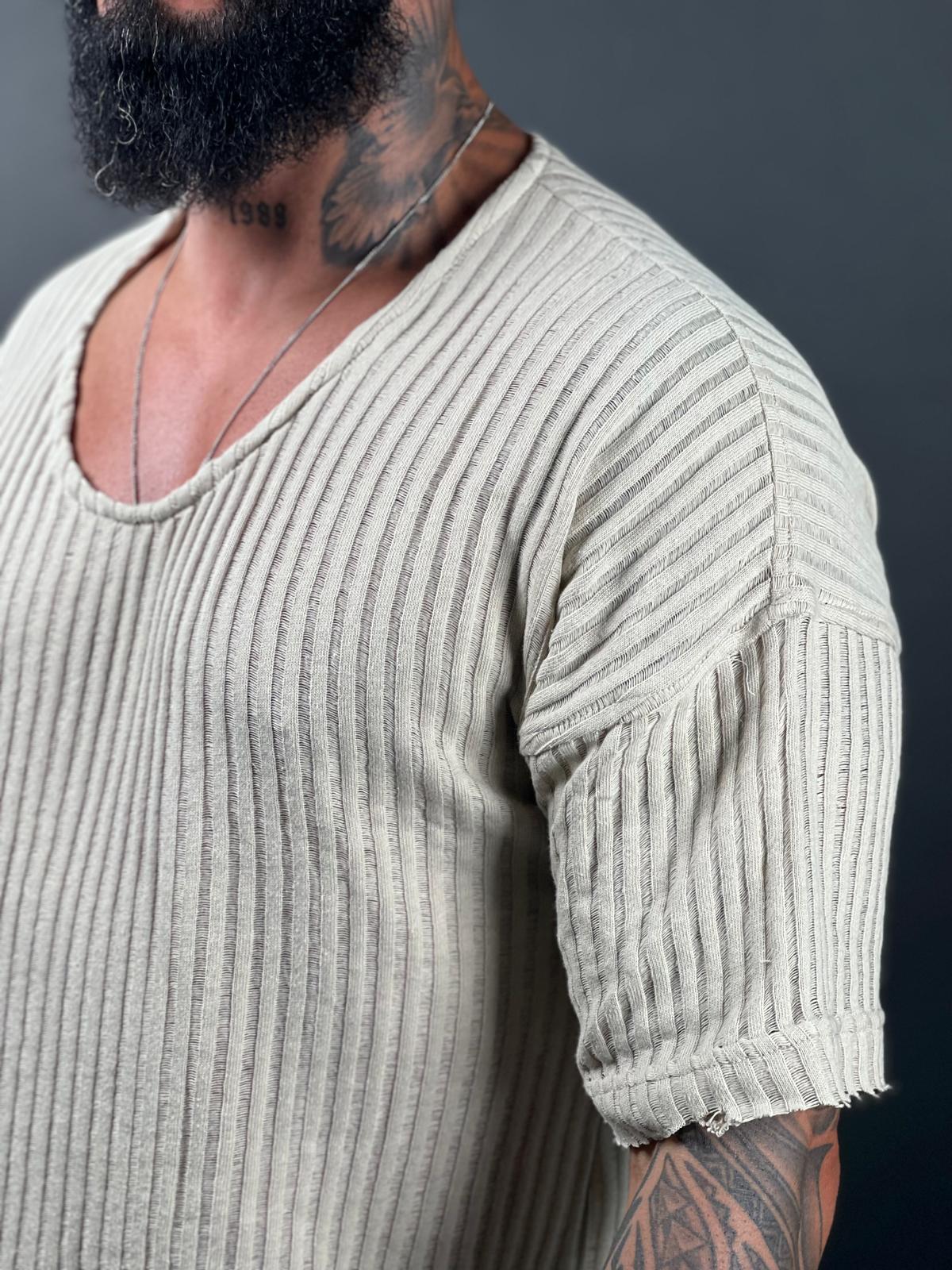 Oversized short-sleeve shirt with a rounded neckline made from striped linen fabric.