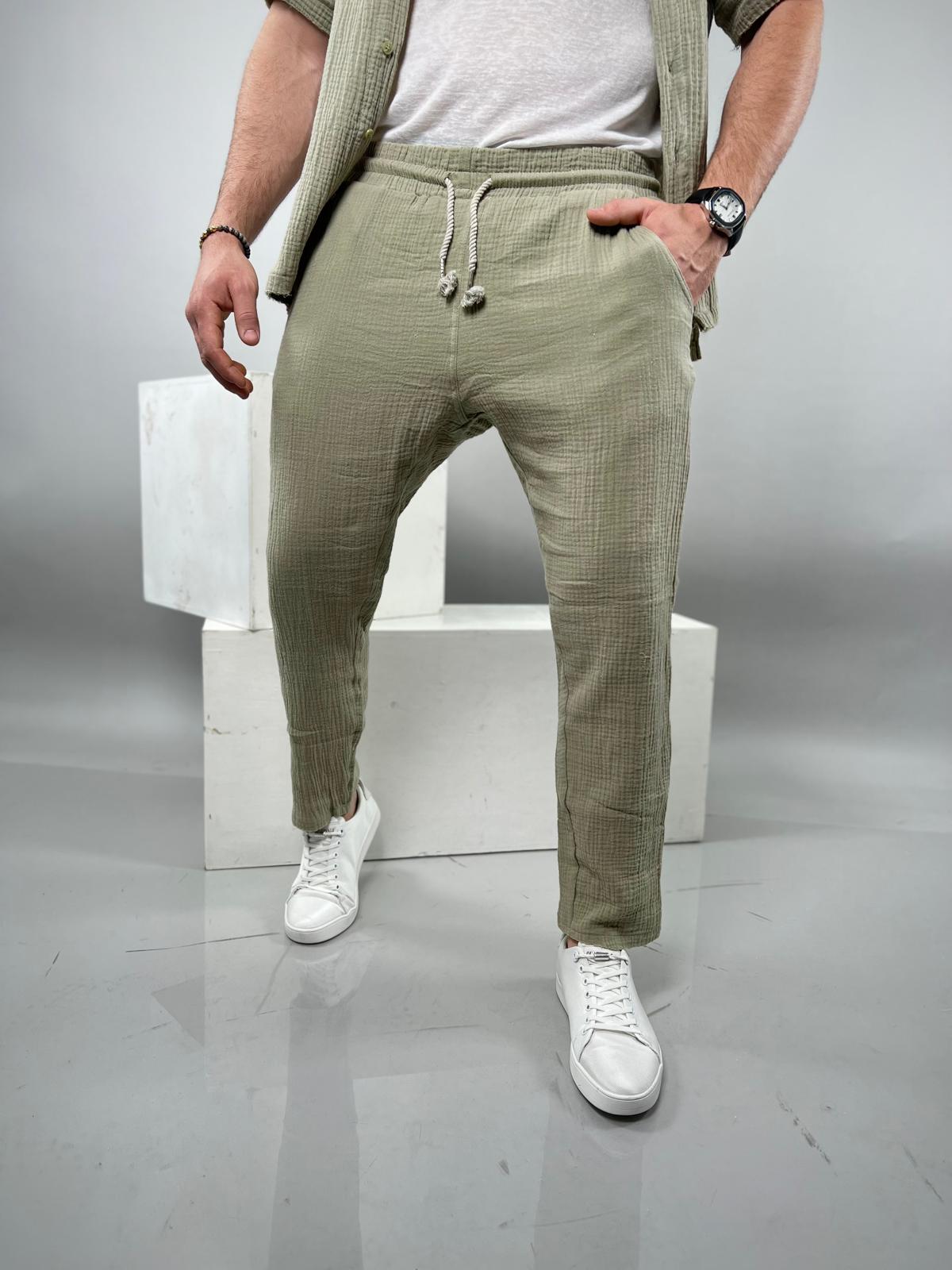 Long linen pants made from soft fabric with delicate distressed finishing.-Soliton collection