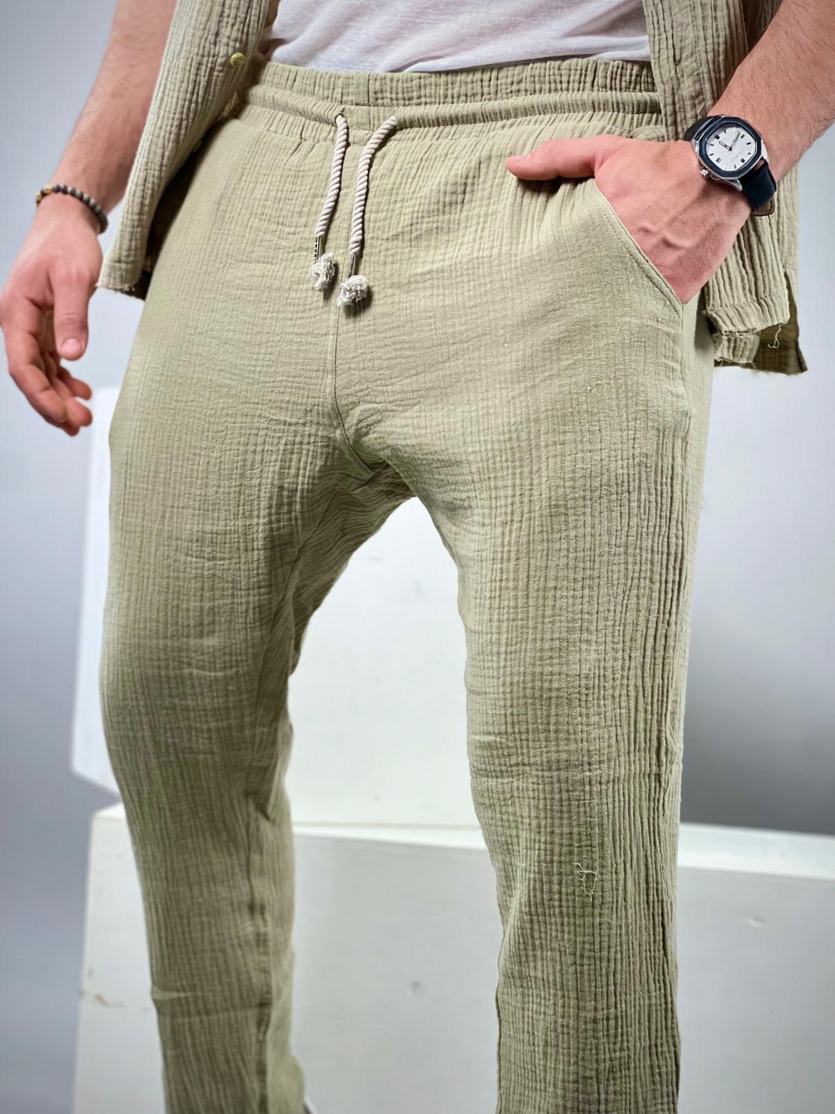 Long linen pants made from soft fabric with delicate distressed finishing.-Soliton collection