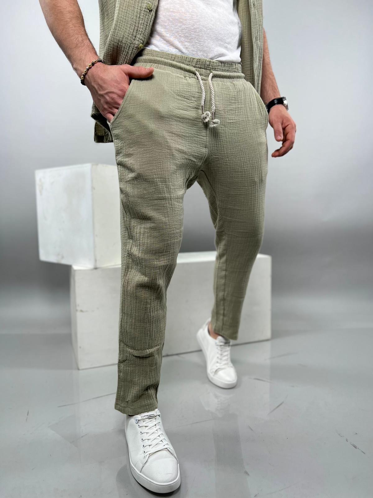 Long linen pants made from soft fabric with delicate distressed finishing.-Soliton collection