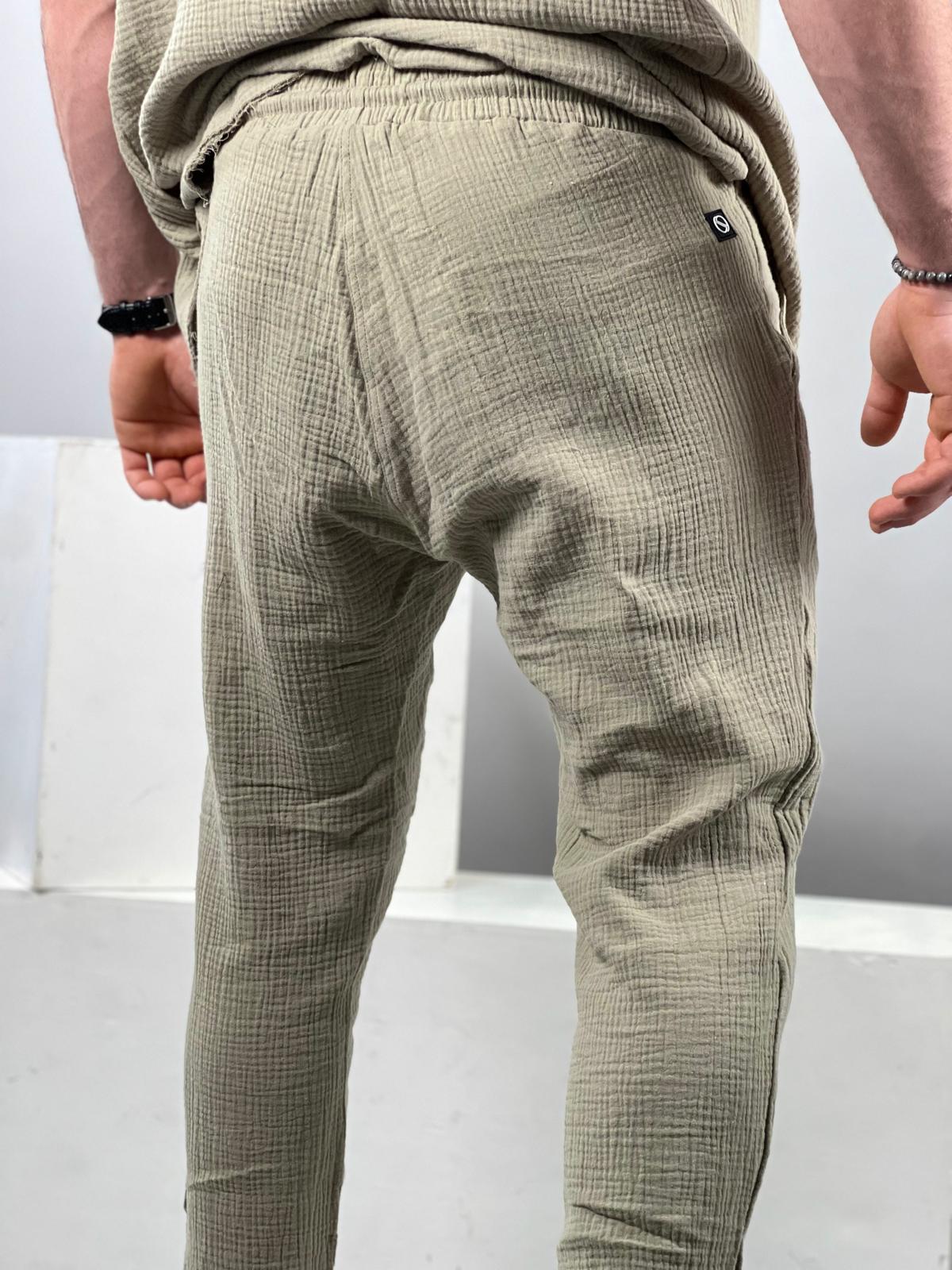 Long linen pants made from soft fabric with delicate distressed finishing.-Soliton collection