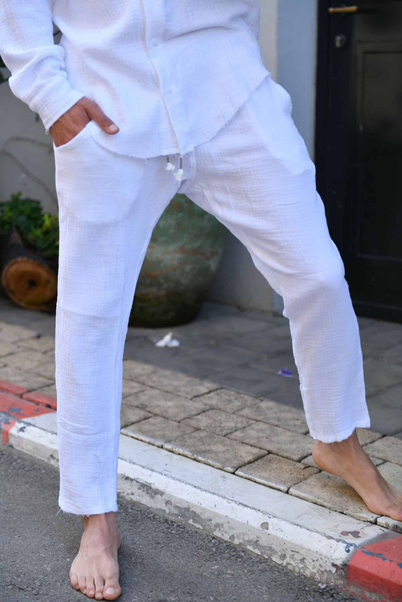 Long linen pants made from soft fabric with delicate distressed finishing.-Soliton collection