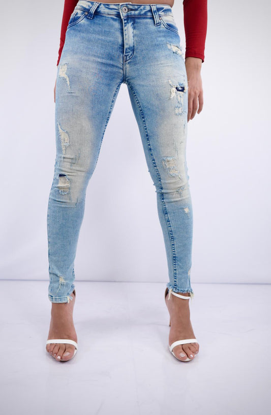 SW-01 – Women’s Low-Rise Distressed Blue Skinny Jeans with Frayed Hem