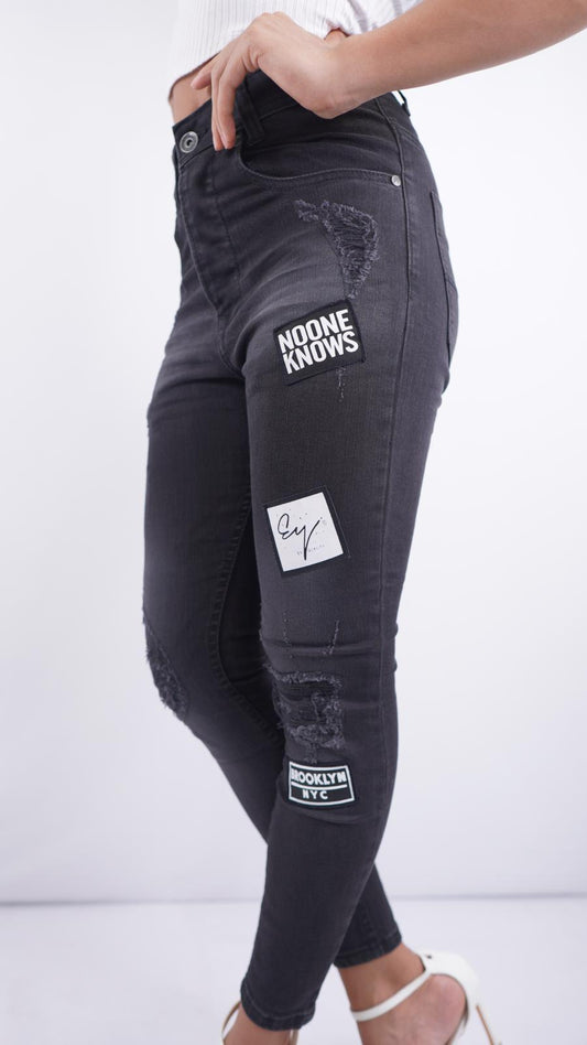 S-207 – Women’s High-Waist Black Skinny Jeans with Rips & One-Leg Patchwork