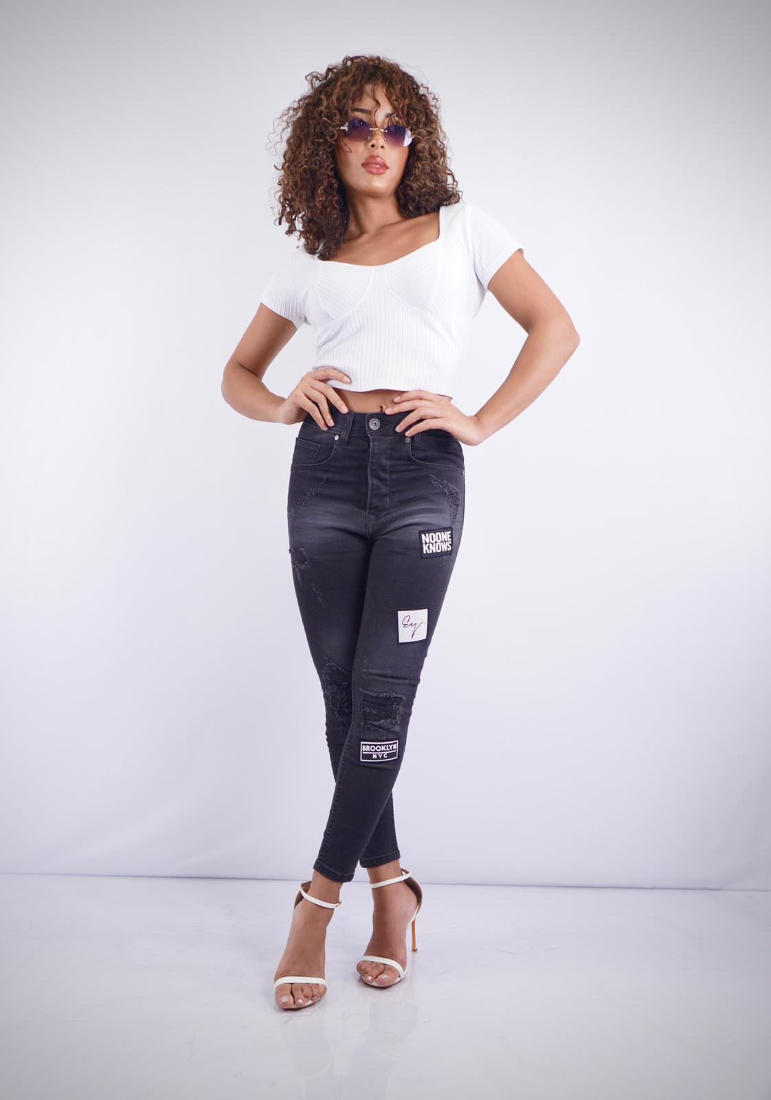 S-207 – Women’s High-Waist Black Skinny Jeans with Rips & One-Leg Patchwork