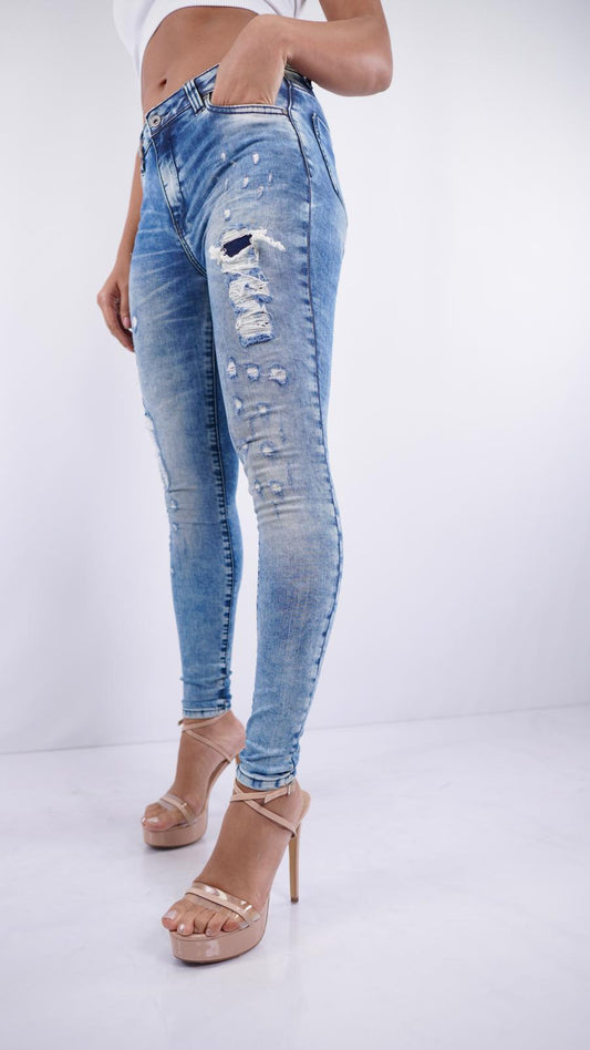 ES-5 – Women’s Mid-Rise Blue Skinny Jeans with Stitched Rips & Abraded Details