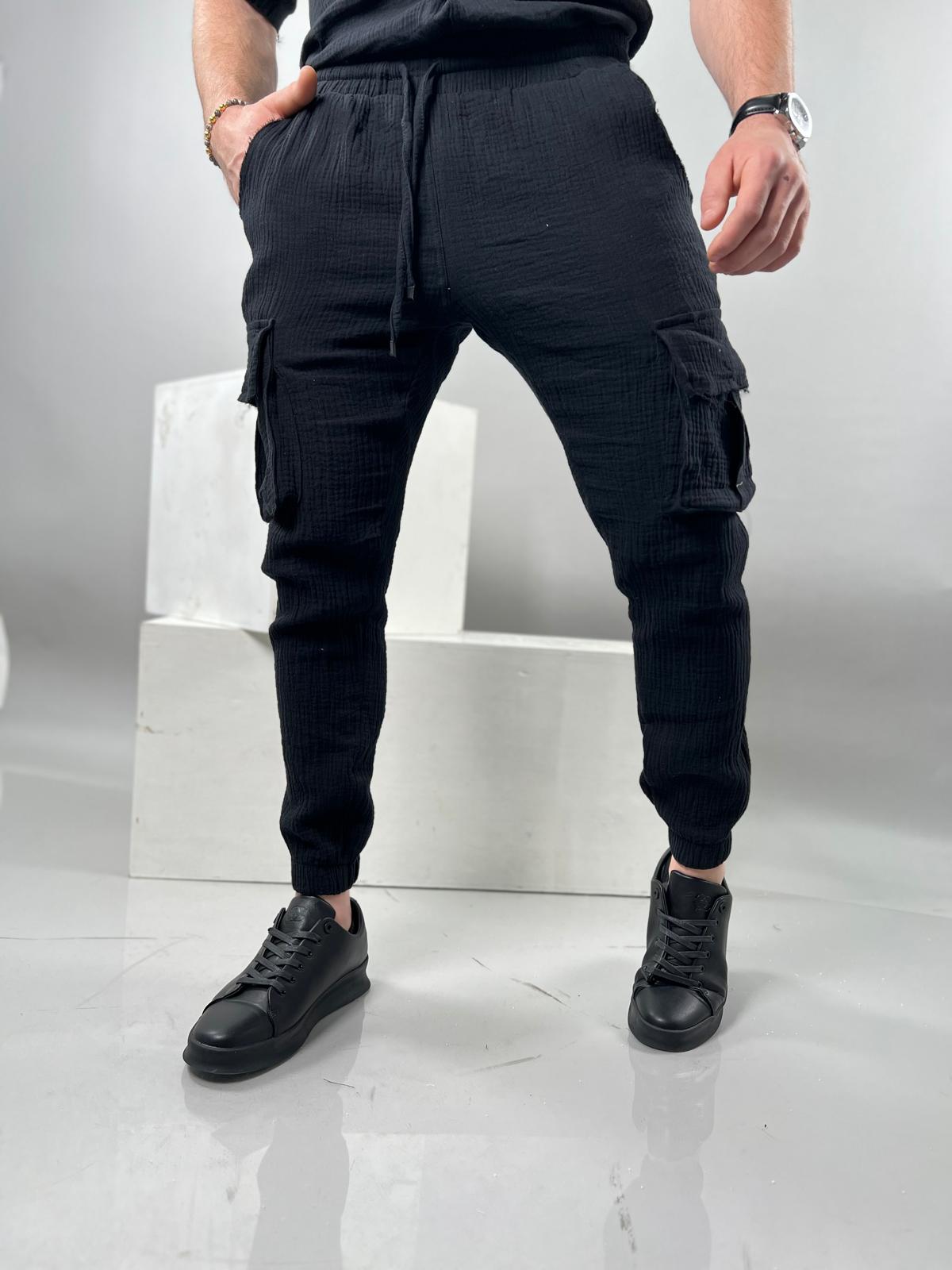 Long linen cargo pants with an elastic waistband, Soliton collection.